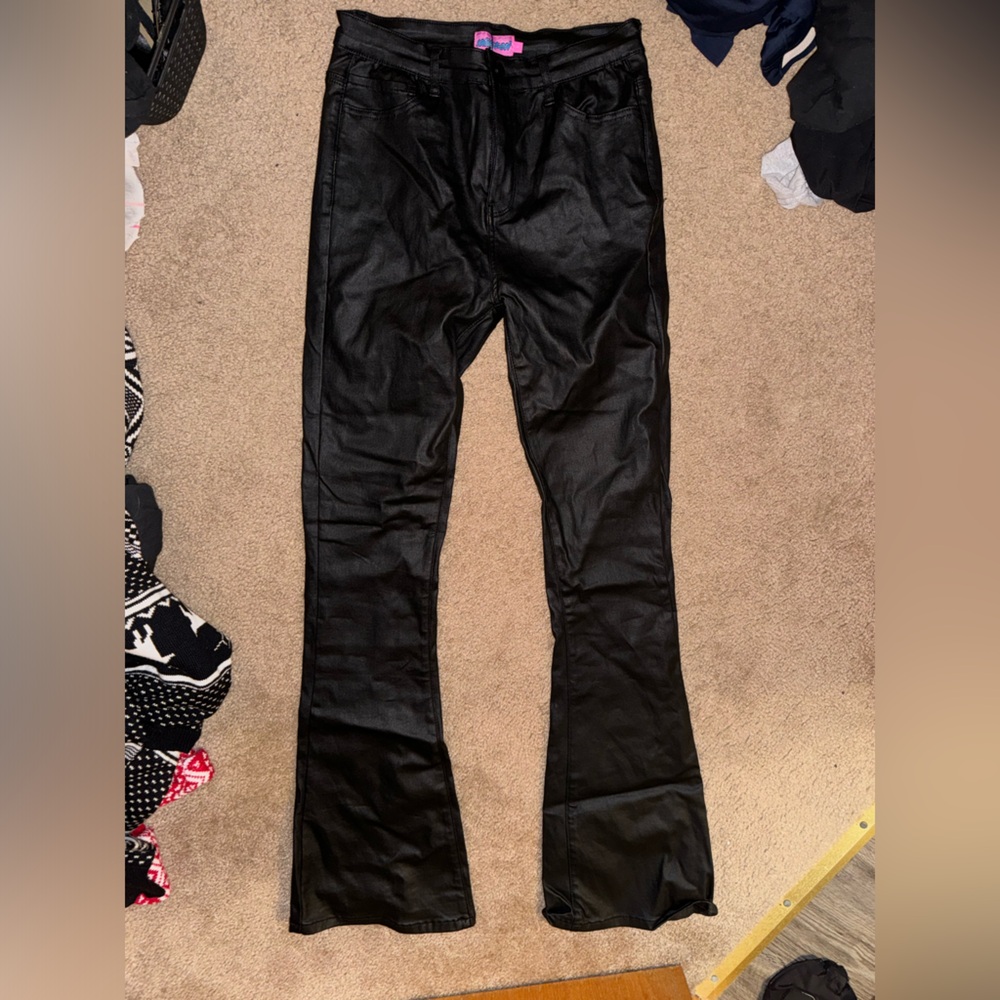 Editked black leather pants. Tag on, never worn before. Size large